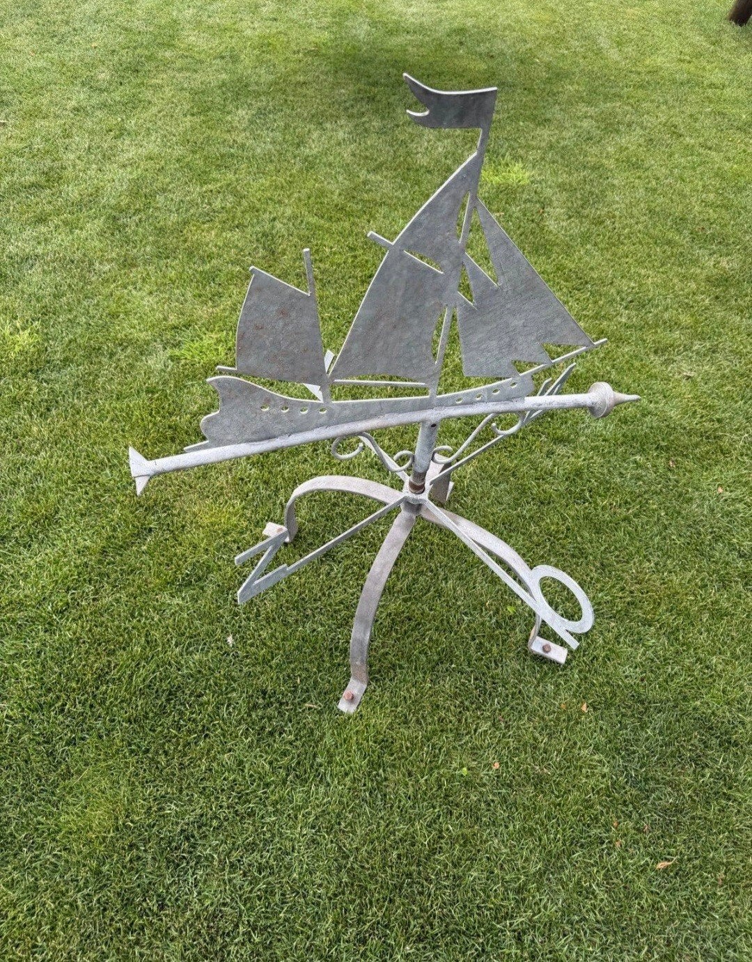 metalen windwijzer schoorsteen, Ophalen