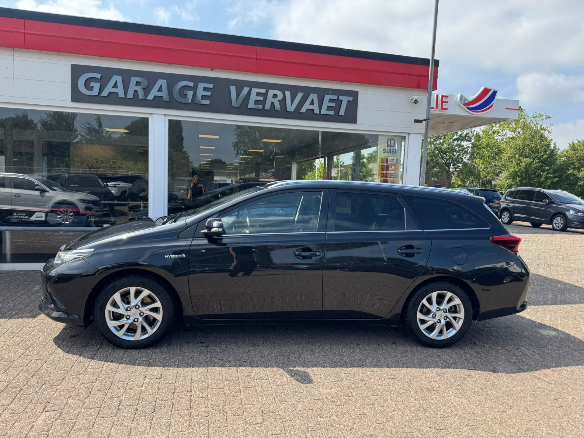 Toyota Auris Touring Sports 1.8 Hybrid Lease (bj 2015), Auto's, Toyota, Stof, Gebruikt, Origineel Nederlands, Hybride Elektrisch/Benzine