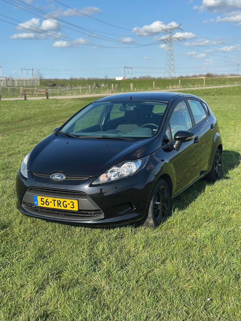 Ford Fiësta 1.25 44KW 5DR 2012 Zwart, Auto's, Ford, Voorwielaandrijving, Stof, 40 €/maand, 4 cilinders