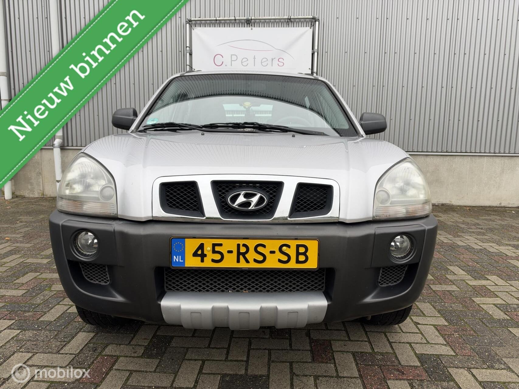 Hyundai Tucson 2.0i Dynamic 2005 / Airco / Trekhaak / Nieuwe, Gebruikt, 4 cilinders, Origineel Nederlands, Handgeschakeld