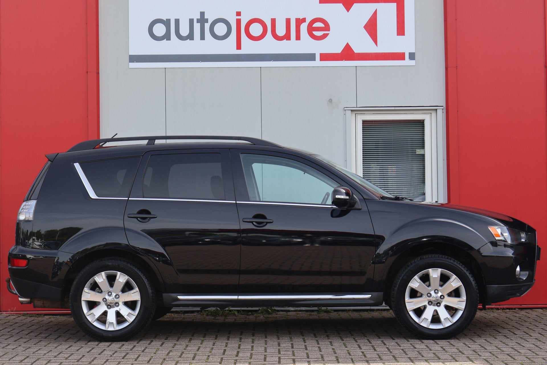 Mitsubishi Outlander 2.0 Intro Edition (bj 2011, automaat), Auto's, Stof, Zwart, 4 cilinders, Zwart