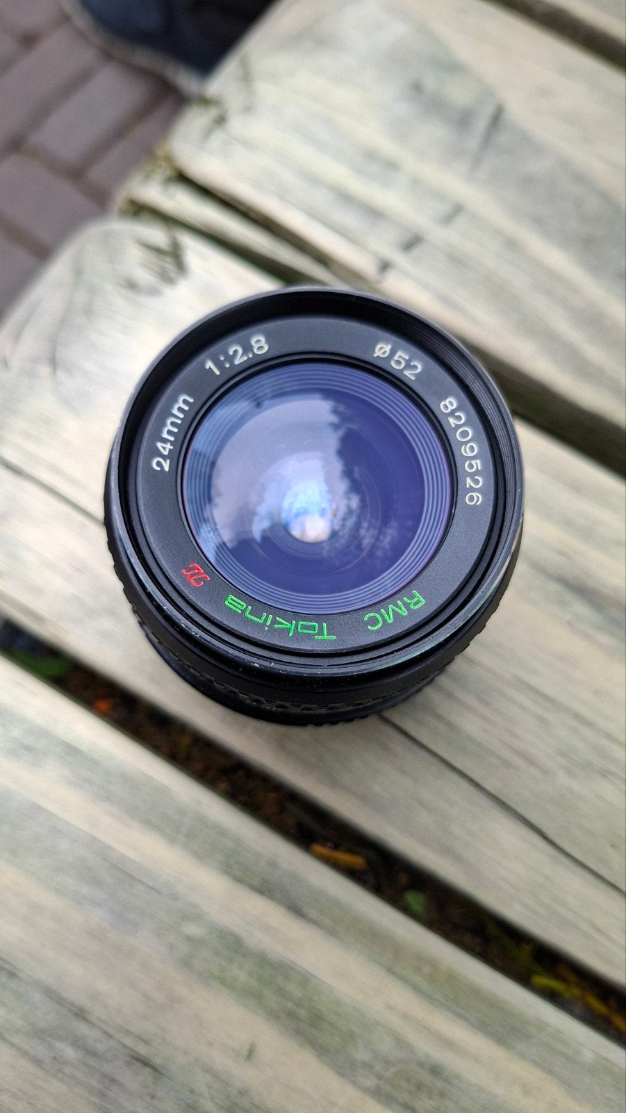 Tokina 24mm F 2.8 olympus OM vatting, Ophalen of Verzenden, Groothoeklens