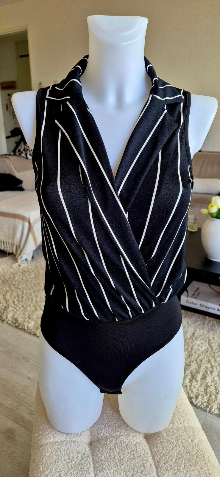 Zwart-wit gestreepte bodysuit met drukknopen, Kleding | Dames, Maat 38/40 (M), Zwart, Ophalen of Verzenden, Zonder mouw