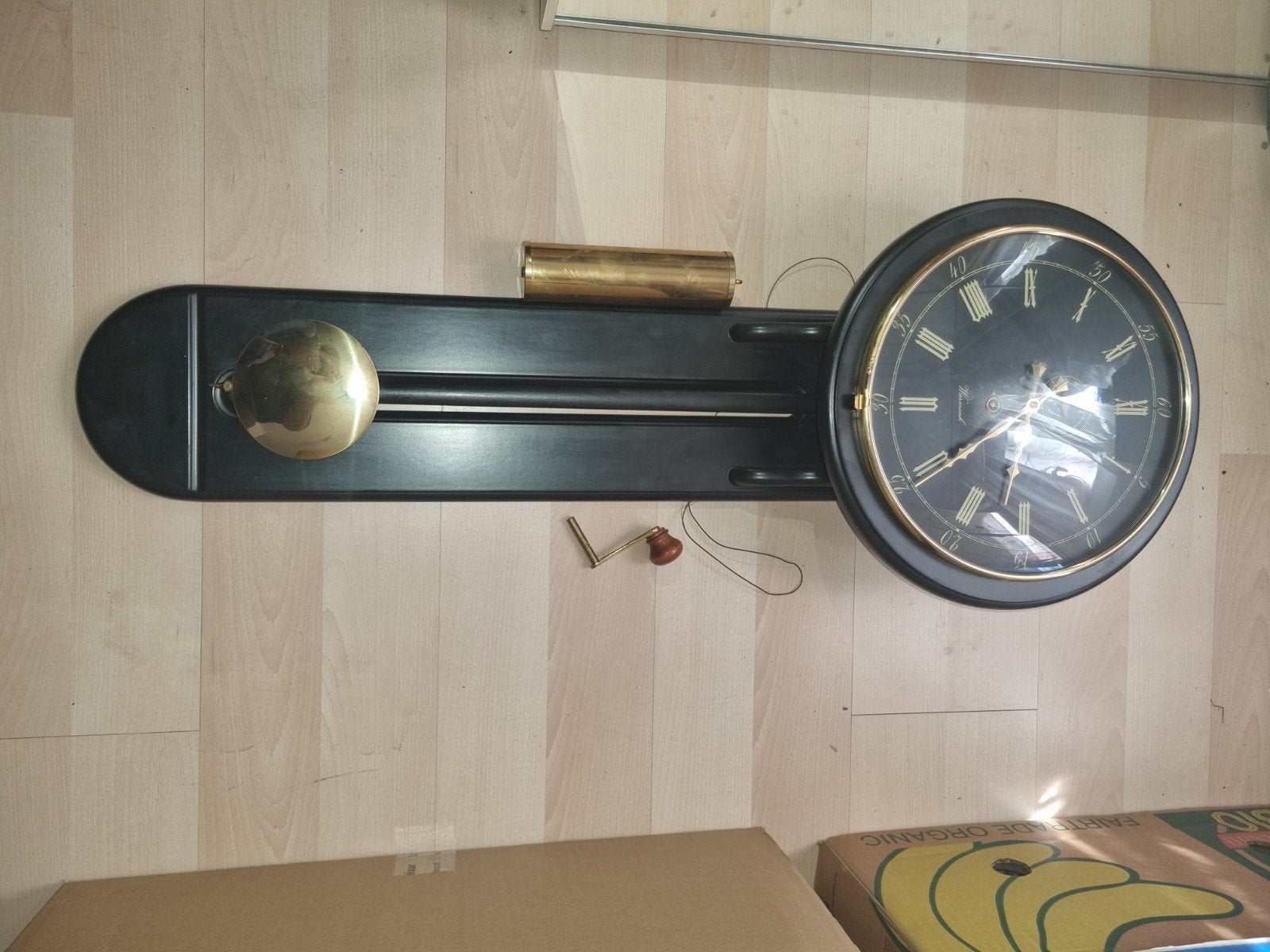 Warmink wandklok met slinger zwart goud, Ophalen
