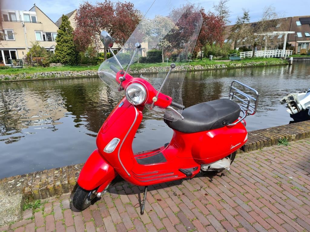 Rode Vespa LX50 2t scooter uit 2007, 18317 km, Ophalen