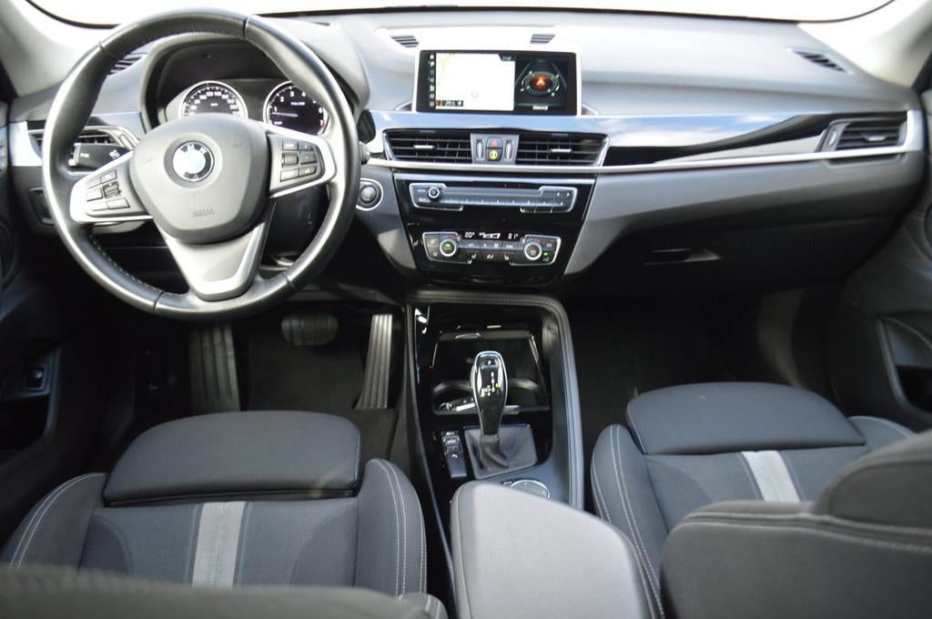 BMW X1 sDrive20i ExecEdition, Trekhaak, GARANTIE, NIEUWSTAAT, Auto's, BMW, 1998 cc, Stof, Automatische klimaatregeling, Zwart