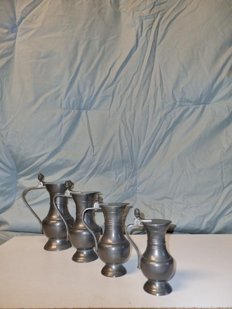 Set tinnen schenk kruikjes, Ophalen