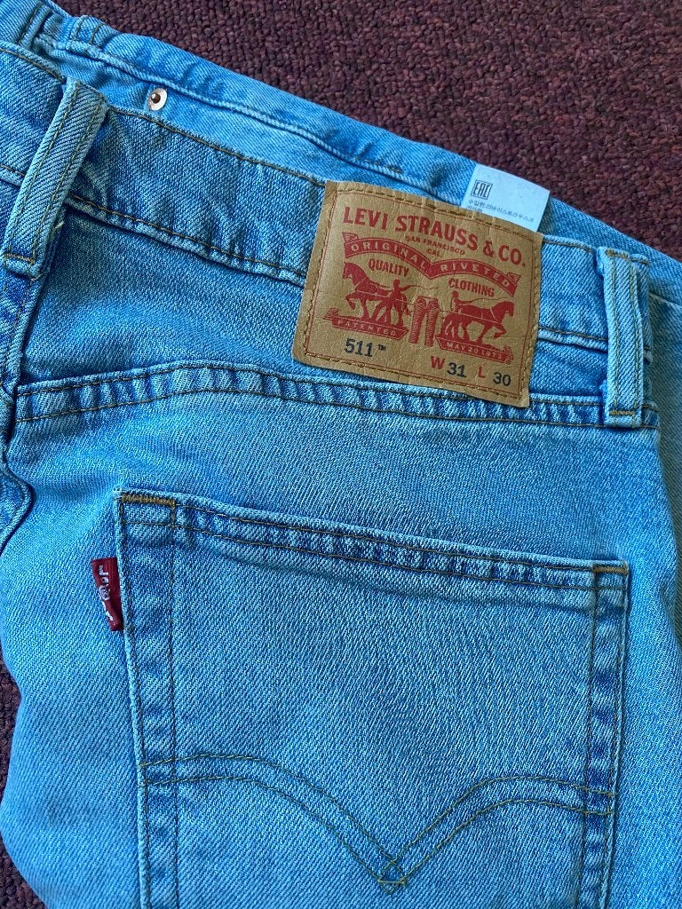 Levi s jeans, Ophalen of Verzenden, Zo goed als nieuw, Blauw, W33 - W34 (confectie 48/50)