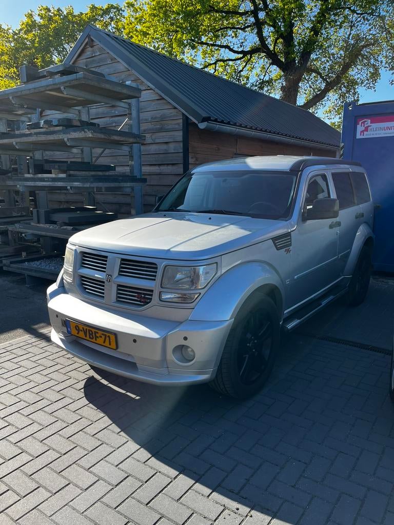 YOUNGTIMER Dodge Nitro 4.0 V6 AWD 2009, Auto's, Automaat, Origineel Nederlands, Vierwielaandrijving, 750 kg