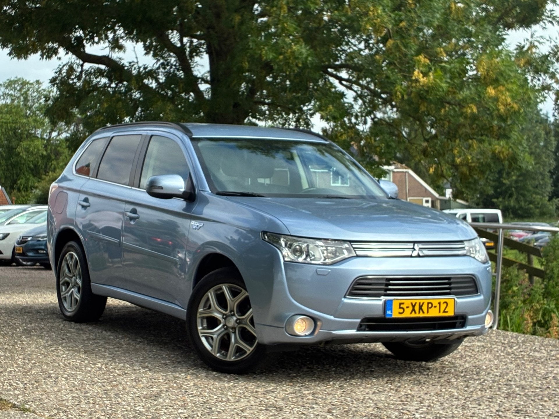 Mitsubishi Outlander 2.0 PHEV Executive Edition | Half leder, Zwart, 4 cilinders, Blauw, Leder en Stof