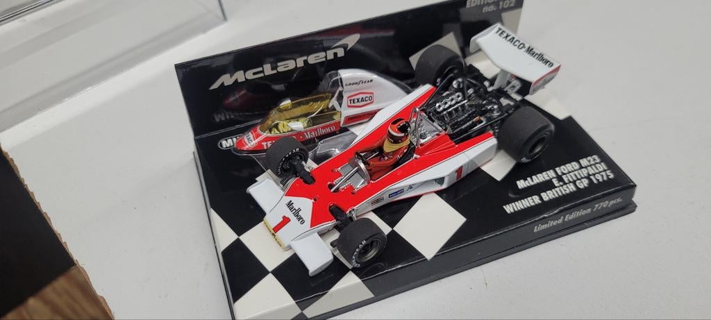 Minichamps McLaren Ford M23 British GP 1975 E.Fittipaldi, Ophalen of Verzenden, Zo goed als nieuw, Auto, MiniChamps