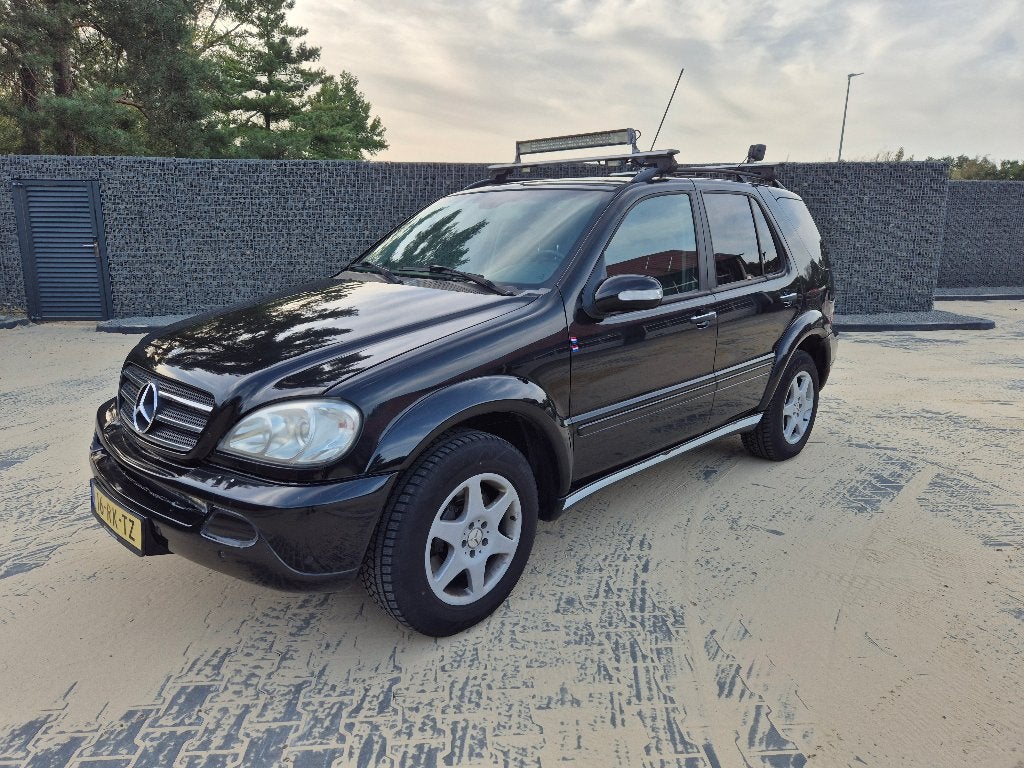 Mercedes-Benz M-Klasse 4.0 CDI Ml400 4MATIC AUT 2002 Zwart, Auto's, Automaat, 7 stoelen, Zwart, Leder