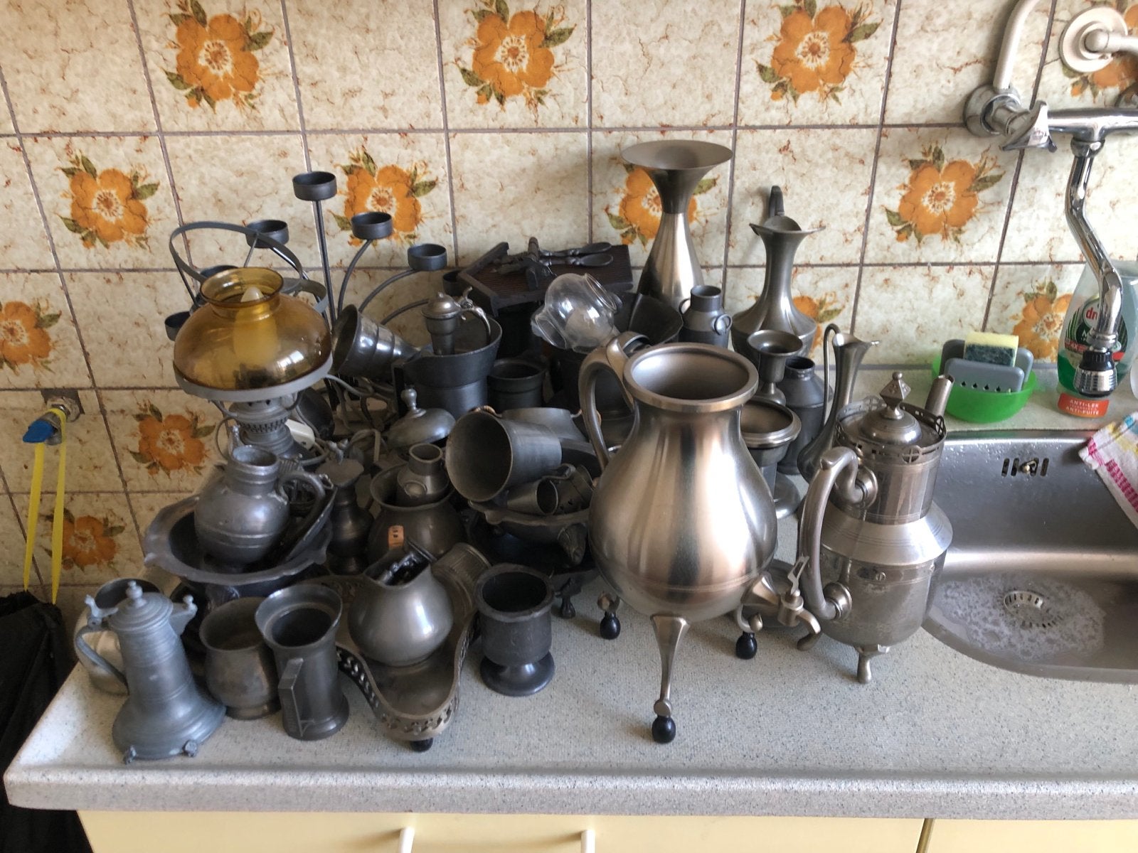 Grote collectie antiek tinwerk en metalen voorwerpen, Ophalen