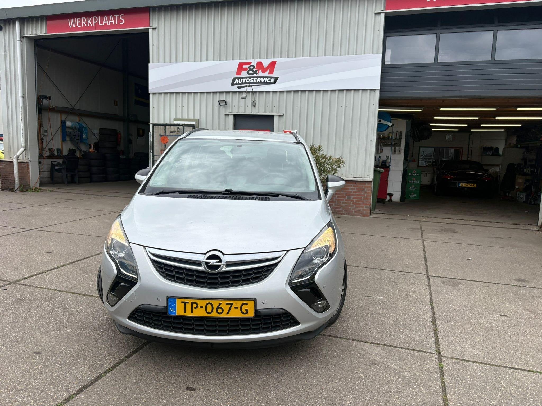 Opel Zafira Tourer 1.4 Edition 7p. Clima, stoel-stuur verwar, Auto's, Opel, Euro 5, Gebruikt, Zwart, 4 cilinders