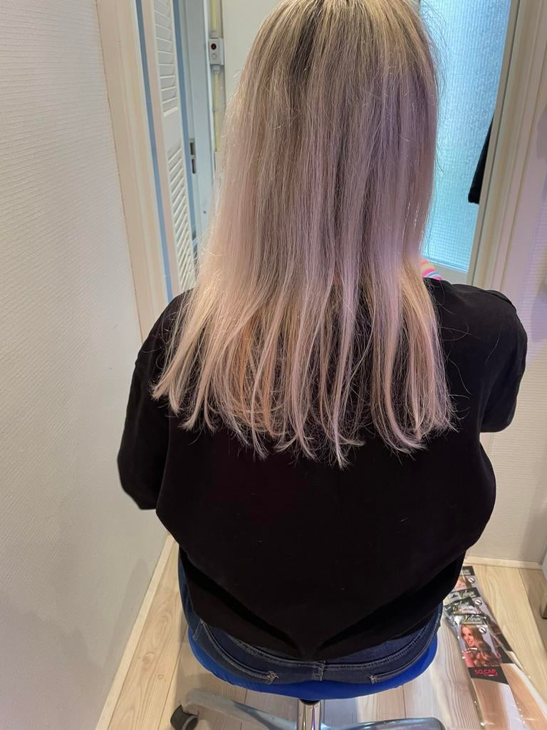 Haar extensions plaatsen. Verlening.