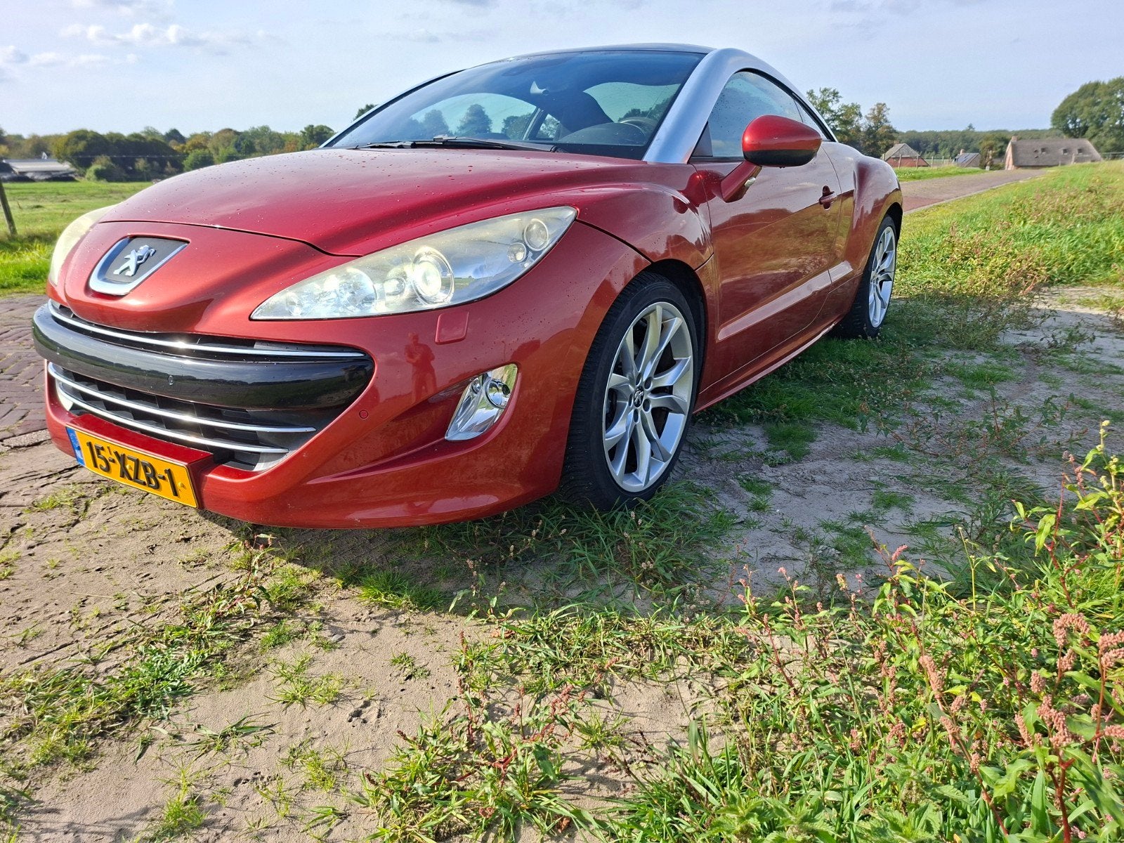 Peugeot RCZ 1.6 THP 2012 Rood., Auto's, Voorwielaandrijving, Parkeerassistent, 4 stoelen, Origineel Nederlands