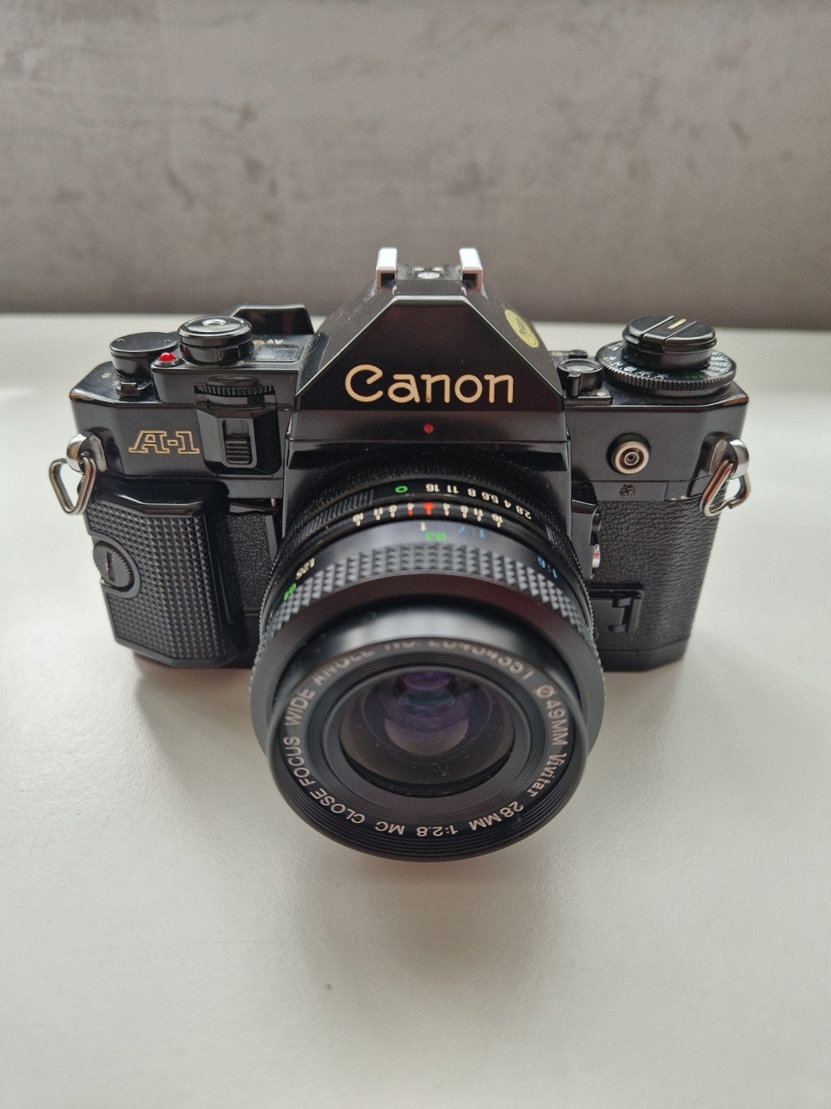 canon A1 analoge camera 28mm f2.8 getest spiegelreflexcamera, Audio, Tv en Foto, Fotocamera's Analoog, Ophalen of Verzenden, Spiegelreflex
