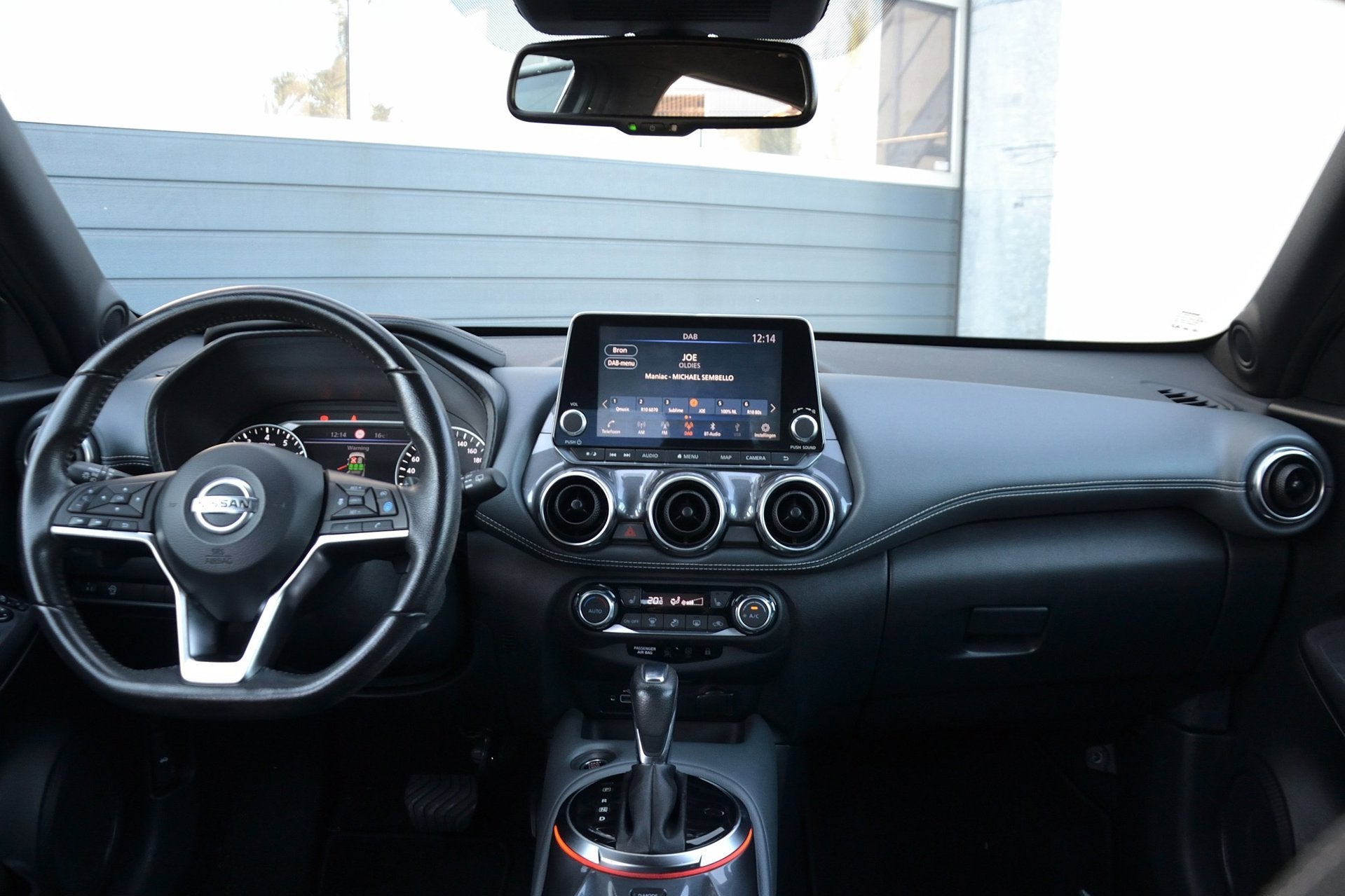 Foto 9 van Nissan Juke 1.0 DIG-T Tekna Automaat | Navigatie | Stoelverw