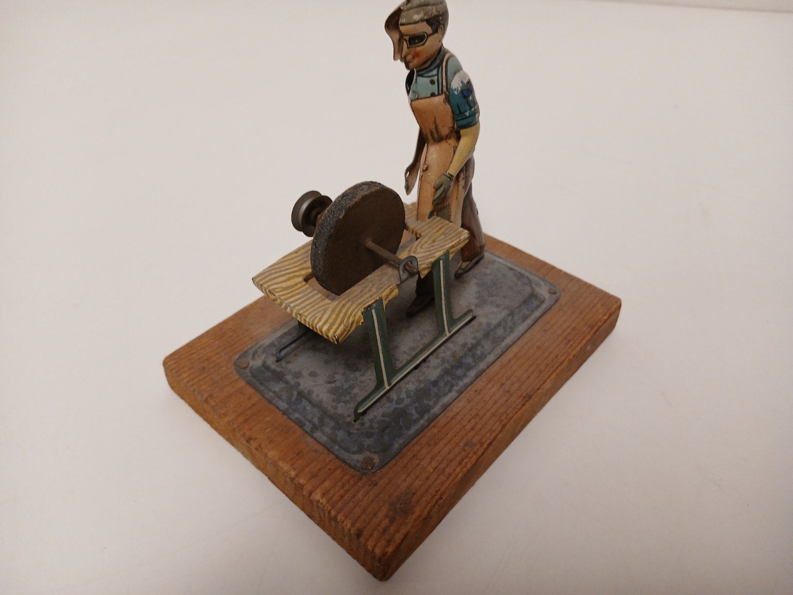 Vintage arnold figuur met slijpsteen jaren 30-50, Antiek en Kunst, Antiek | Speelgoed, Ophalen of Verzenden