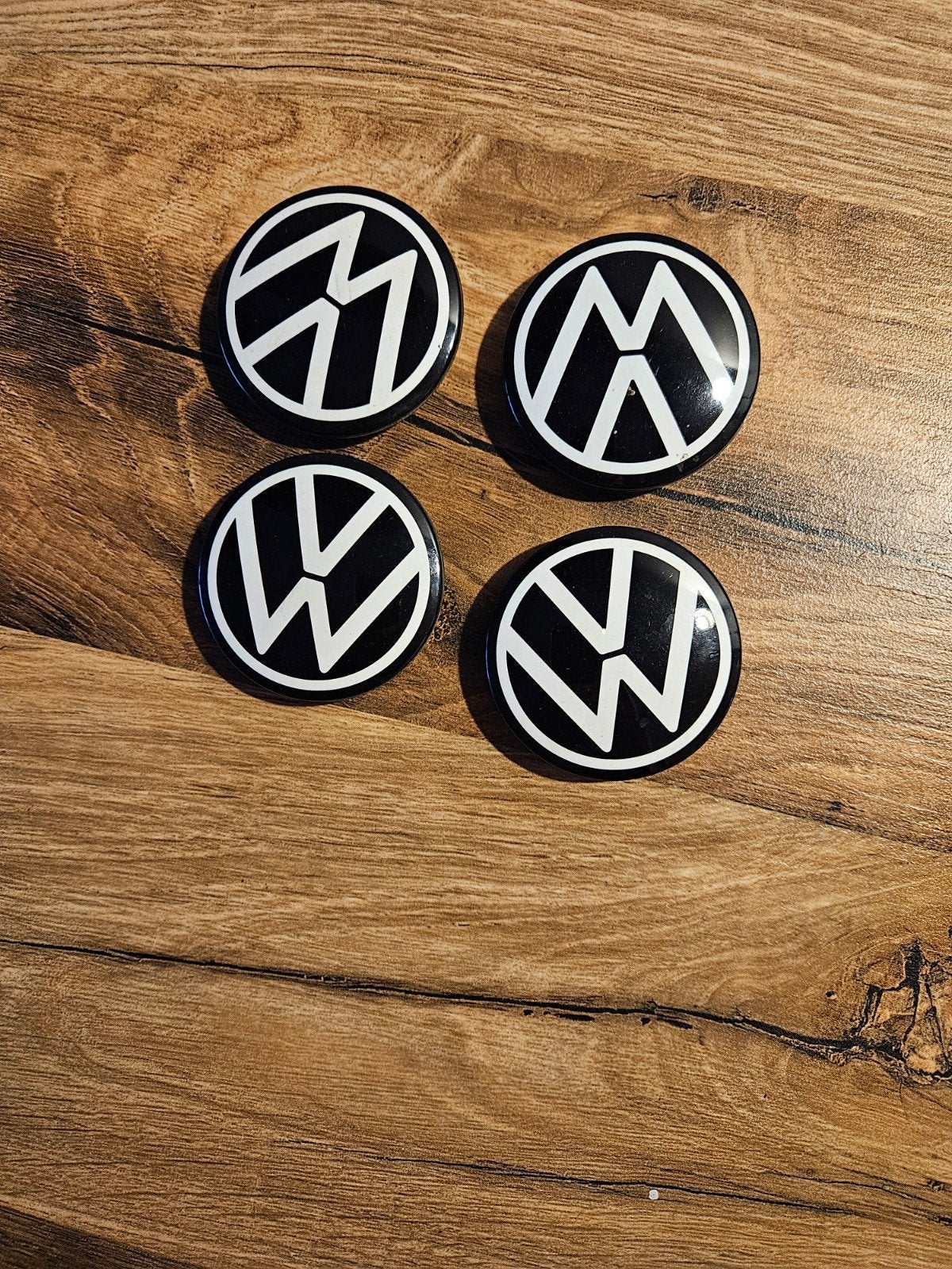 Set van 4 Volkswagen naafdoppen - Zwart/Wit, Ophalen of Verzenden, Zo goed als nieuw