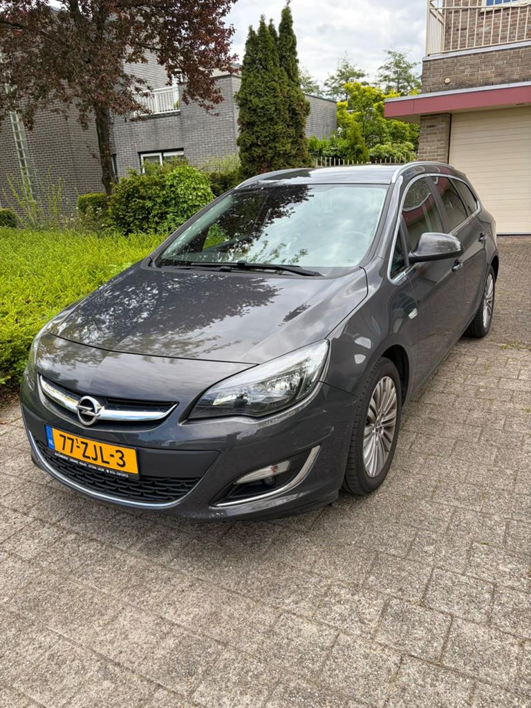 Opel Astra Sports Tourer 1.4 Turbo Automaat LPG | 129.161 km, 15 km/l, 4 cilinders, Origineel Nederlands, Grijs