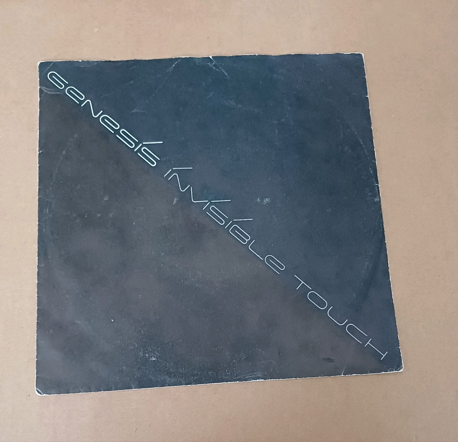 Genesis - Invisible Touch, Cd's en Dvd's, Vinyl Singles, Gebruikt, Pop, Beschermende buitenhoes, Ophalen of Verzenden