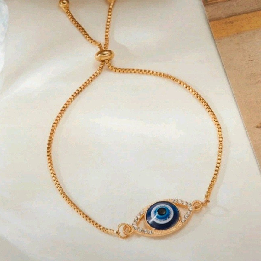 Nieuw Armbandje met Boze Oog en Strass, Ophalen of Verzenden, Nieuw, Goud, Met strass