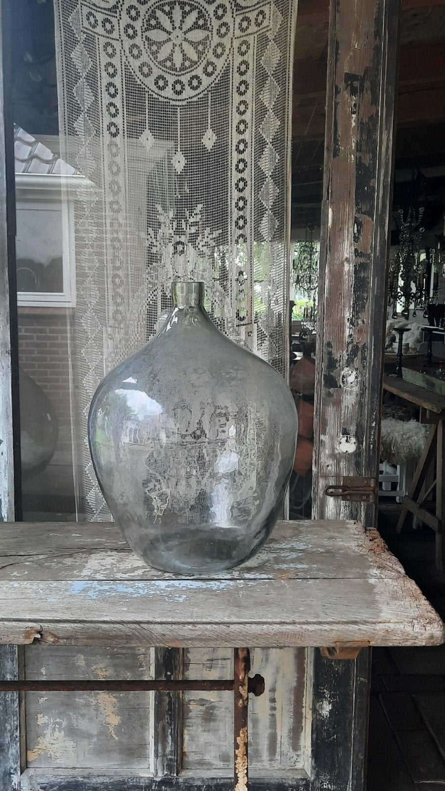 Grote gistfles (nuzzelspul), Ophalen