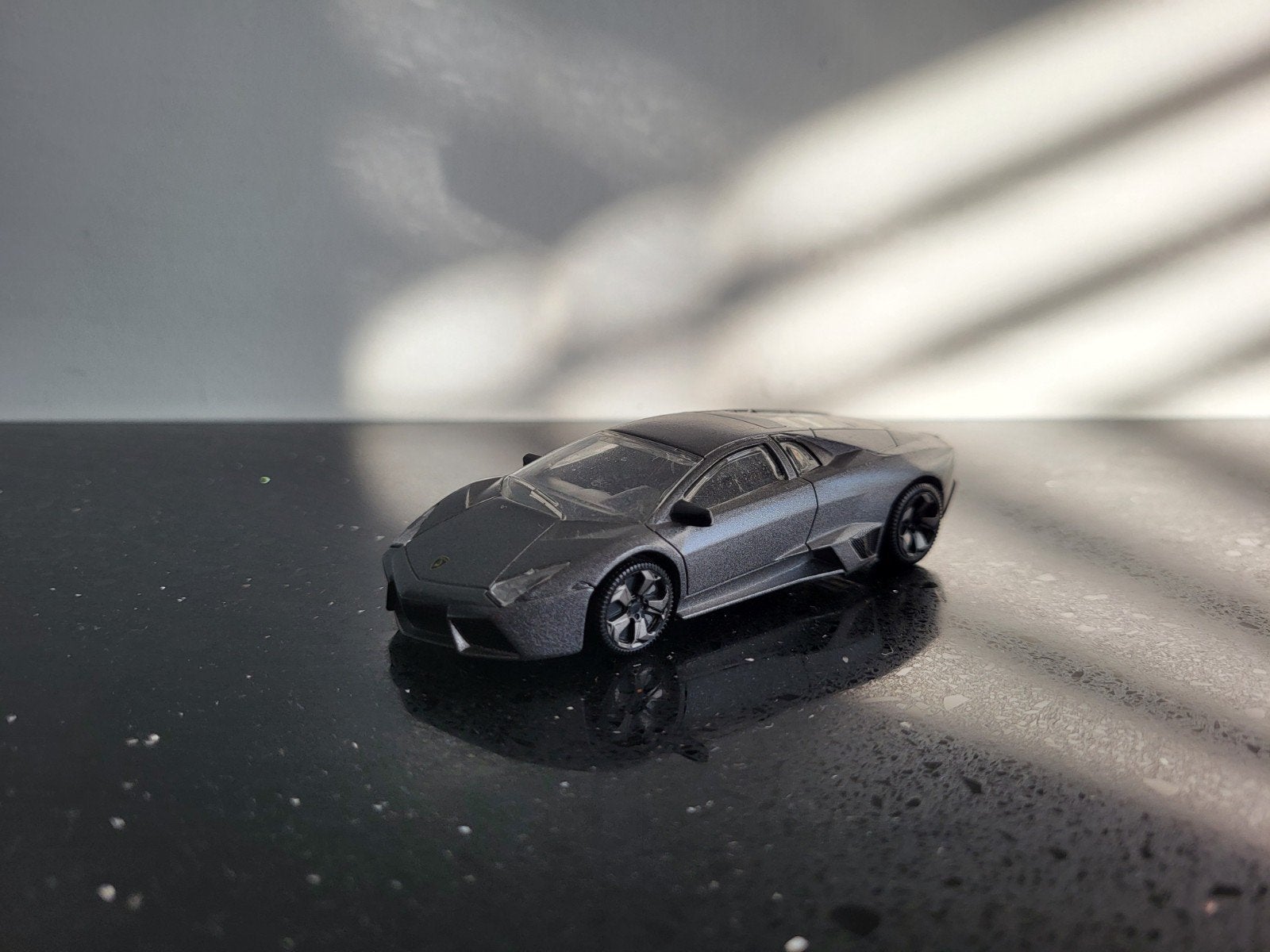 Lamborghini Reventon grijs 1/43 Rastar, Ophalen of Verzenden, Zo goed als nieuw, Auto, Overige merken