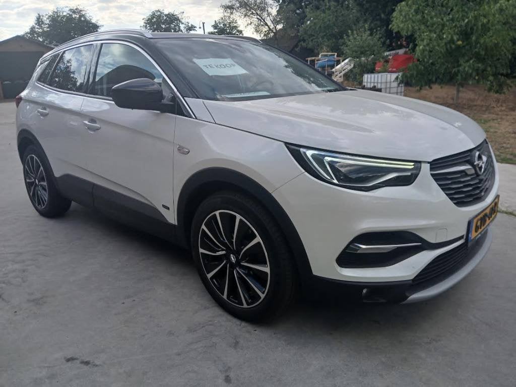 Opel Grandland X 1.6 Turbo Hybrid 225pk Aut 2021 Wit, Auto's, Opel, 1250 kg, Wit, Leder, Bedrijf