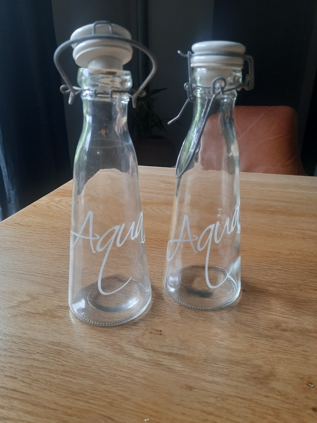 Set van 2 Riviera Maison Agua flessen met beugeldop, Huis en Inrichting, Ophalen, Transparant, Met deksel, Glas