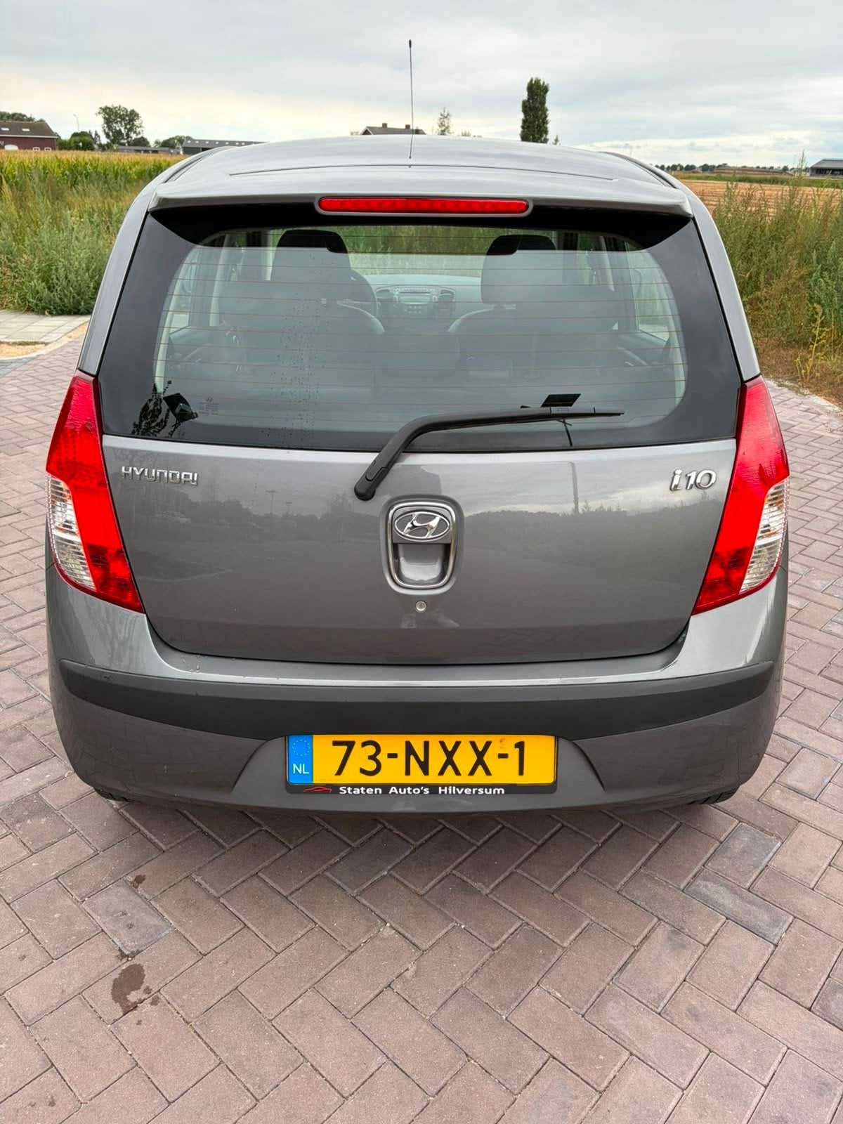 Foto 4 van Hyundai i10 1.1 I 5DR 2010 Grijs