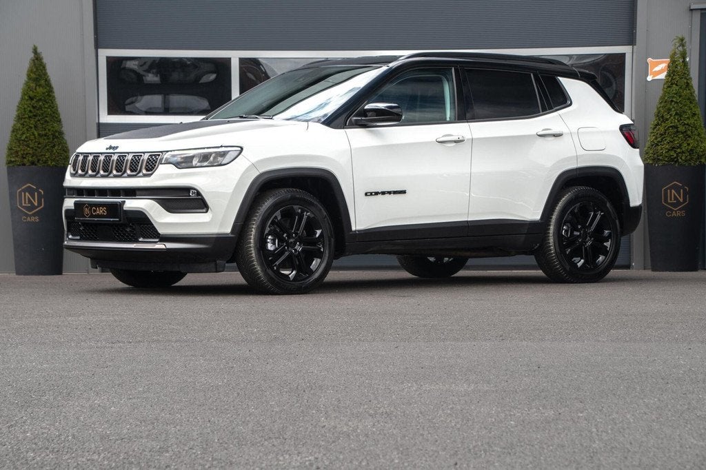 Jeep Compass 4xe 240 Plug-in Hybrid Limited 4WD, Auto's, Jeep, Gebruikt, Zwart, 4 cilinders, Leder en Stof