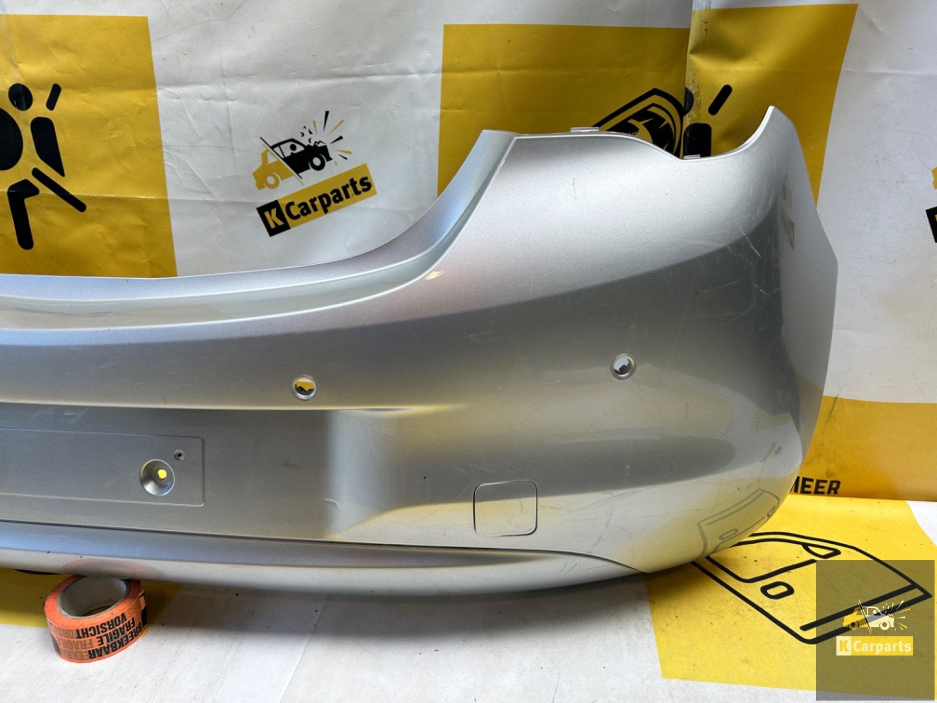 OPEL CORSA E Achterbumper 2014-2019 39002839 bumper 4xPDC, Info@fabrikant.eu, Fabrikantstraat 1
1000 AA  Amsterdam, NL, Opel, Ophalen of Verzenden
