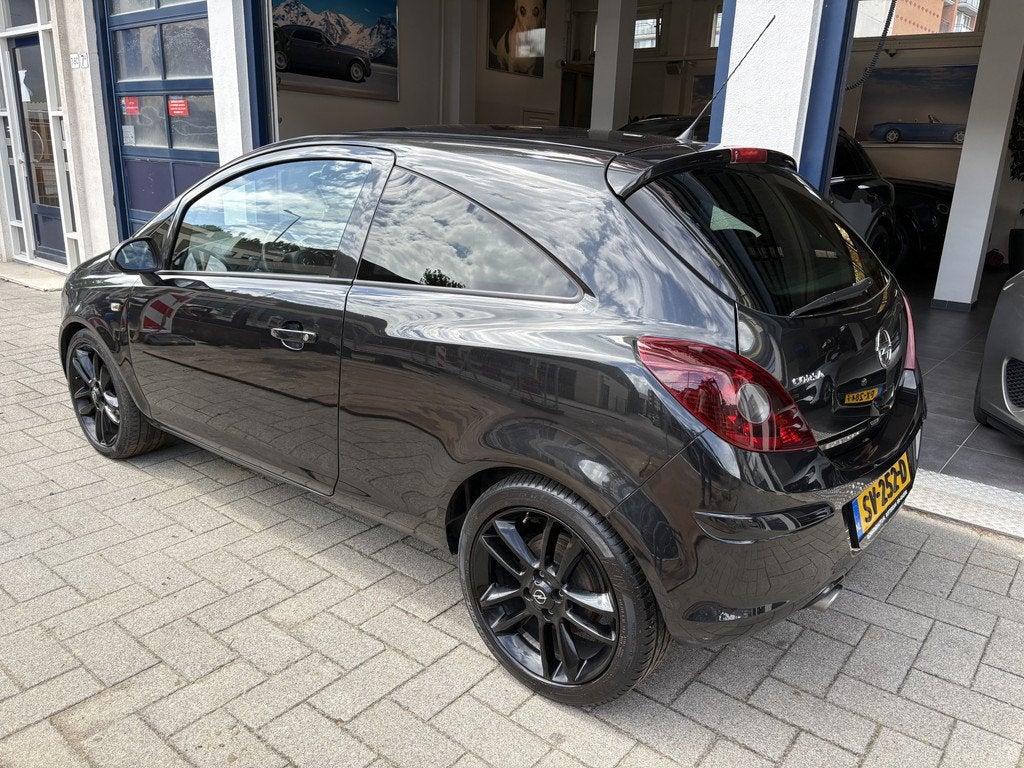 Opel Corsa 1.4-16V Cosmo NW APK 06-2027/AIRCO/CRUISE, Auto's, Voorwielaandrijving, Euro 5, 101 pk, Zwart