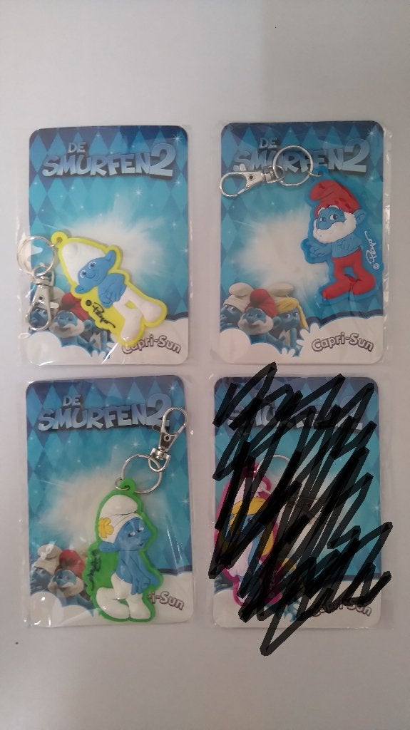 Smurf de smurfen 2 capri-sun sleutelhangers set capri sun, Verzenden, Zo goed als nieuw, Verschillende Smurfen