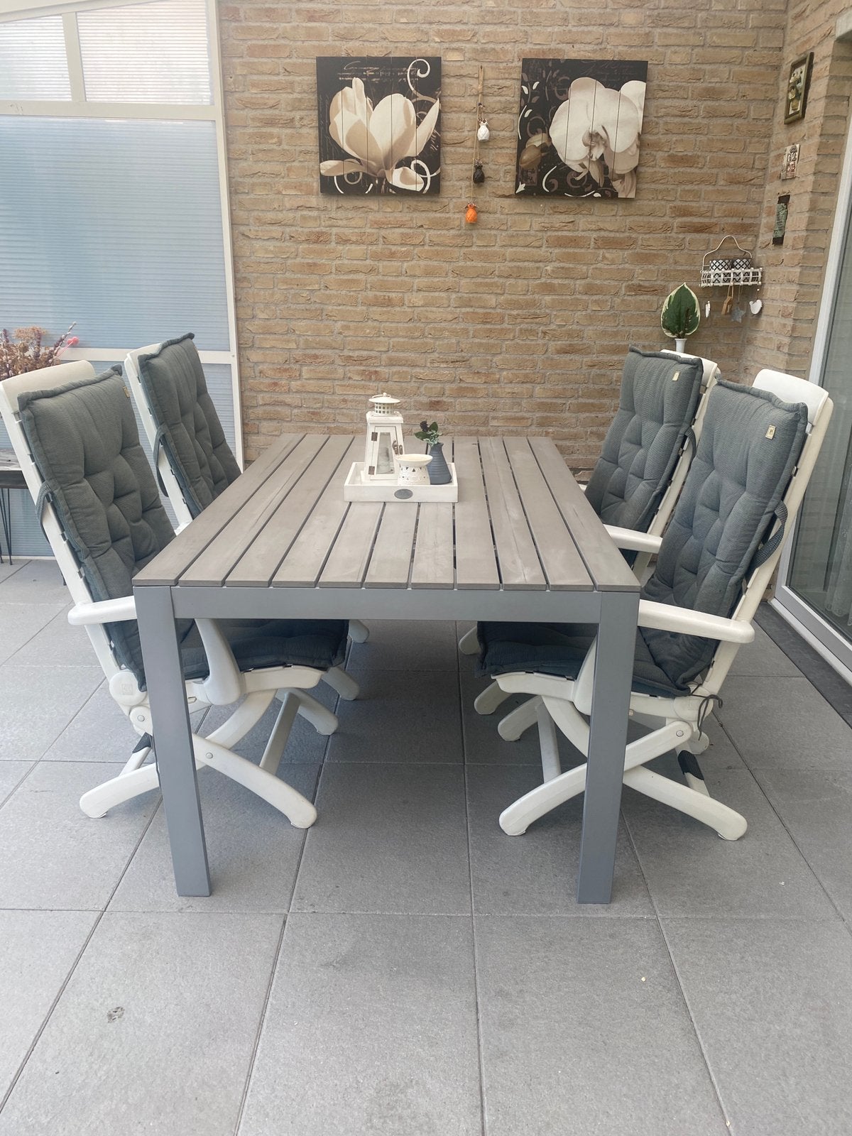 Tuinset,  4 stoelen met kussens en een tafel, Ophalen, Zo goed als nieuw, Kunststof
