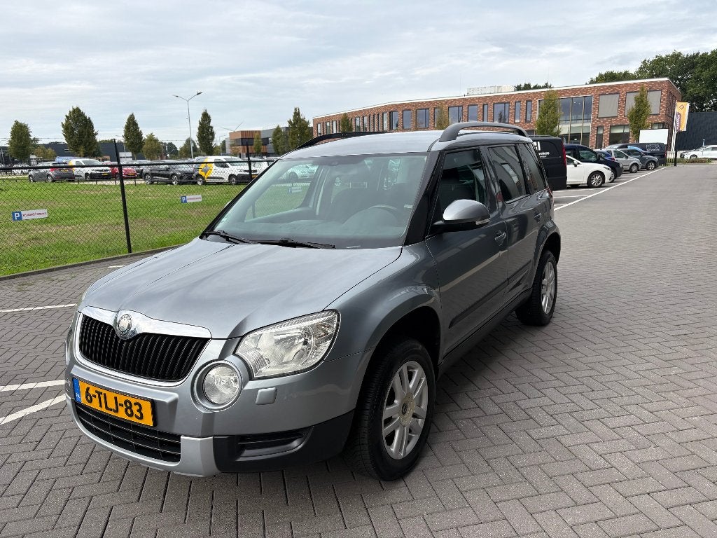 Skoda Yeti 1.2TSI 77KW H6 2010 Grijs airco trekhaak, Auto's, Voorwielaandrijving, Euro 5, Zwart, 4 cilinders