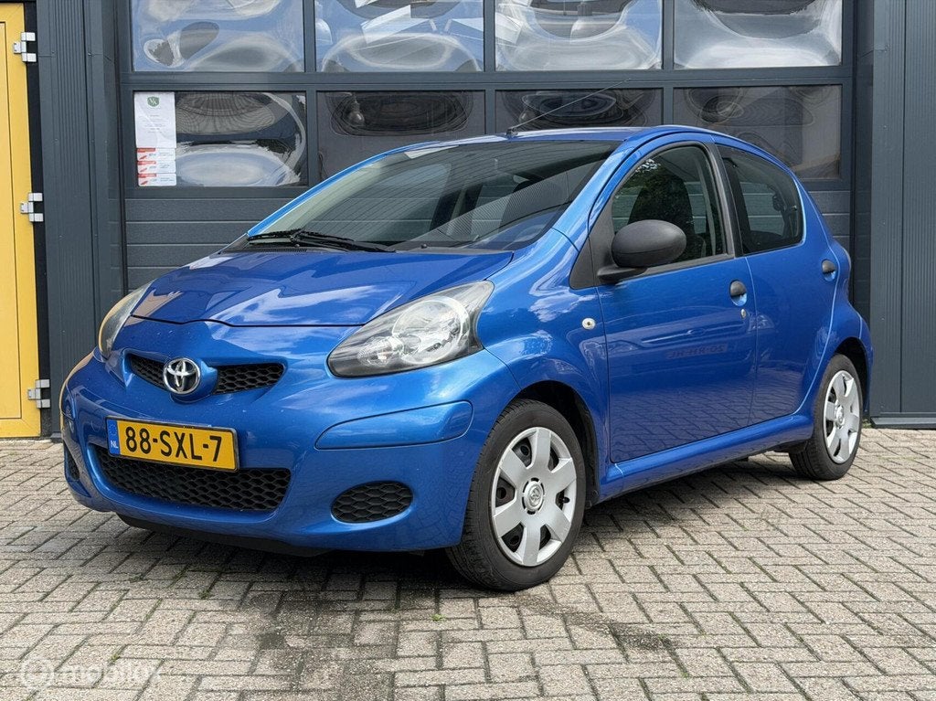 Toyota Aygo 1.0-12V Cool | Apple Carplay | navigatie |, Auto's, Toyota, Voorwielaandrijving, Euro 5, Gebruikt, 68 pk