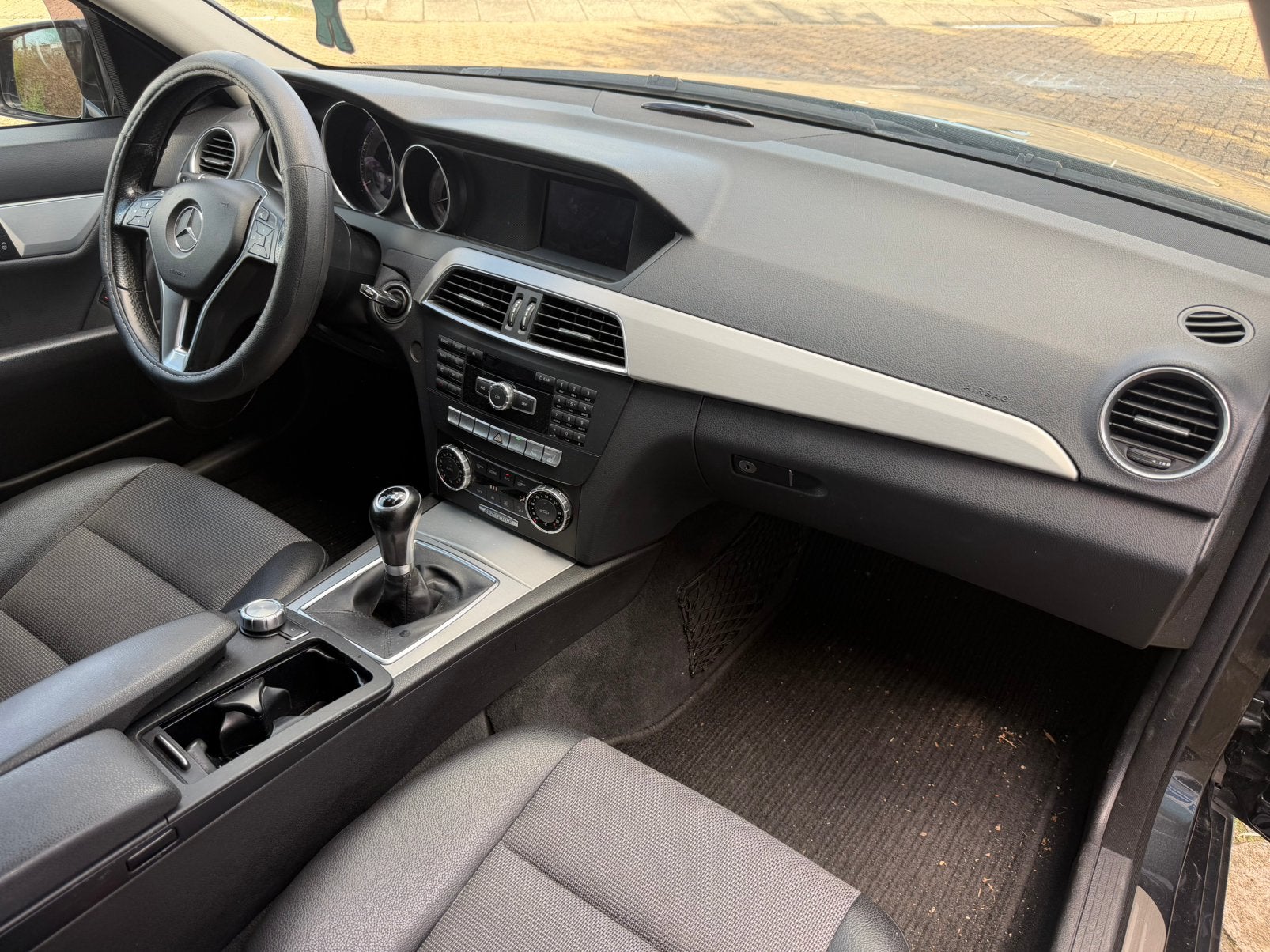 Foto 14 van Mercedes-Benz C-Klasse 1.6 C180 Kompr. Estate 2012 Zwart