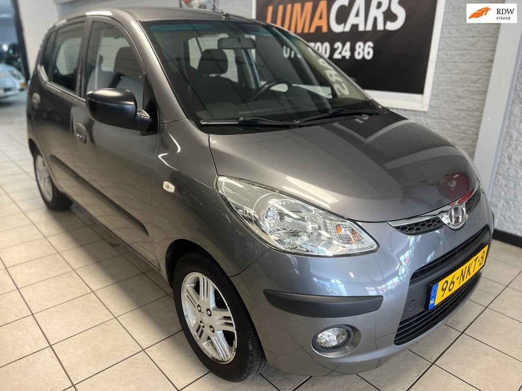 Hyundai I10 1.1 Active Orange Babies |Airco|5-deurs|Trekh., Auto's, Gebruikt, 31 €/maand, 4 cilinders, 400 kg