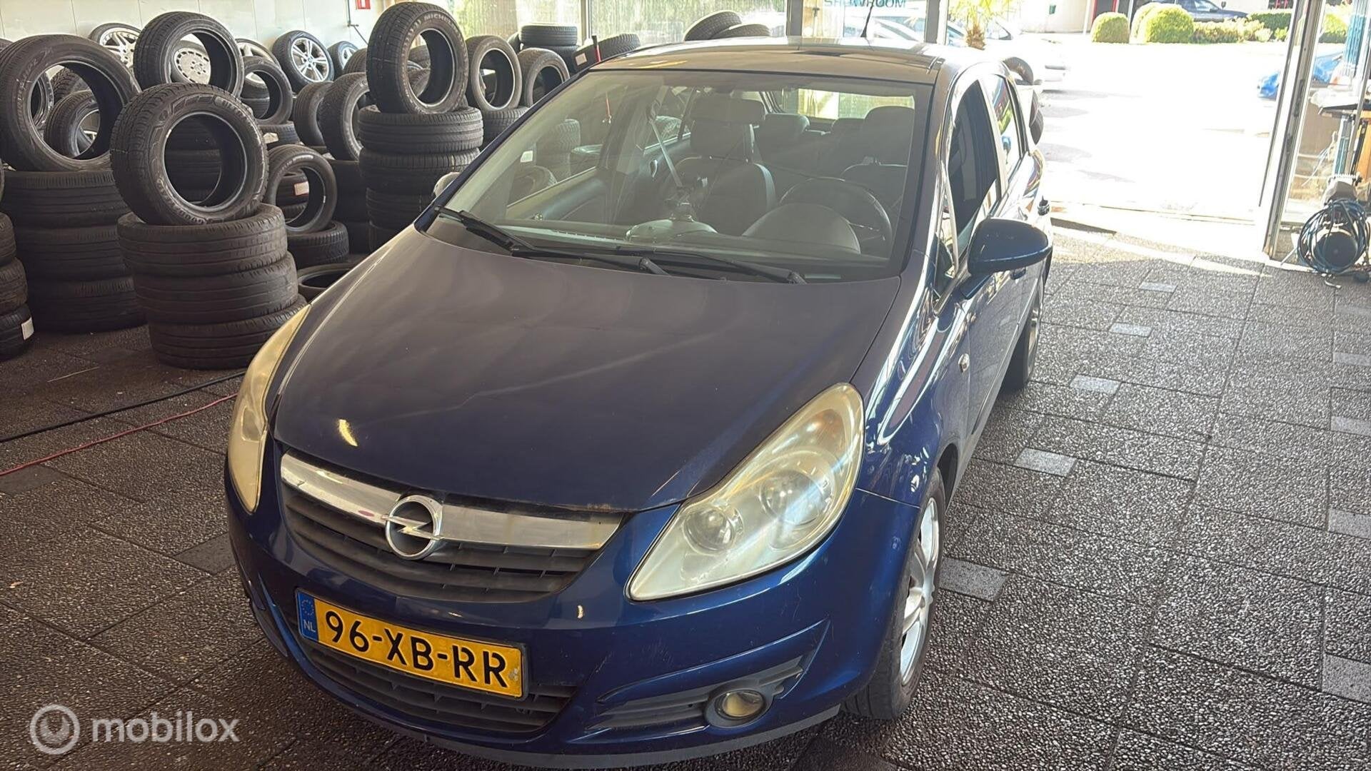 Opel Corsa 1.4-16V Sport, Auto's, Voorwielaandrijving, Gebruikt, 4 cilinders, Blauw