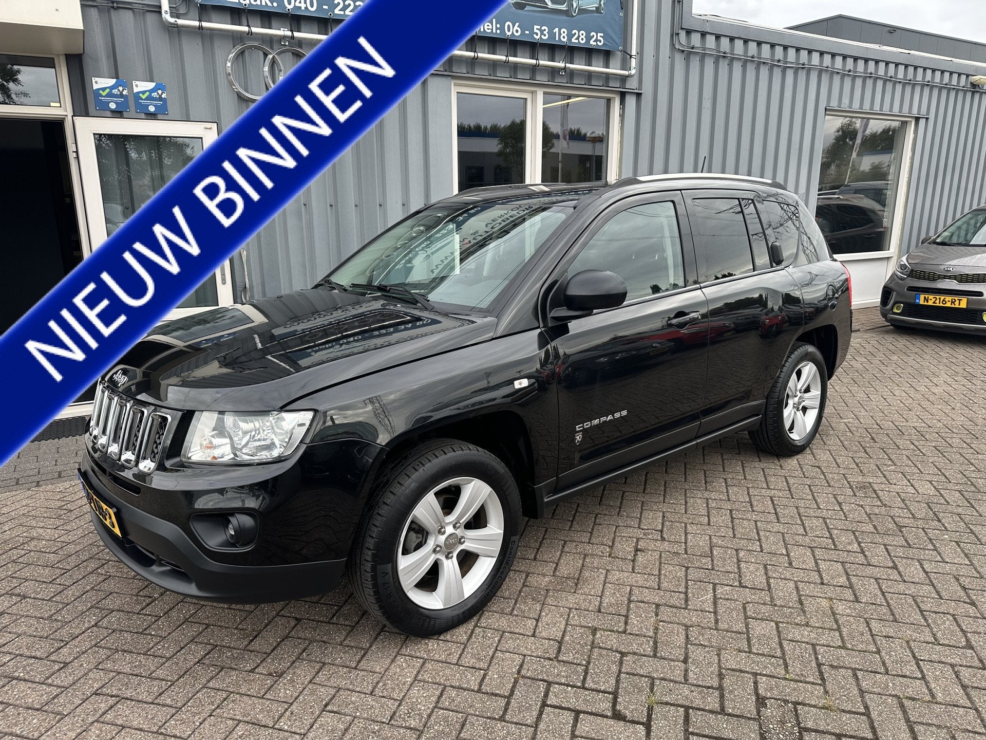 Jeep Compass 2.0 Sport (bj 2012), Auto's, Gebruikt, Zwart, Handgeschakeld, SUV of Terreinwagen