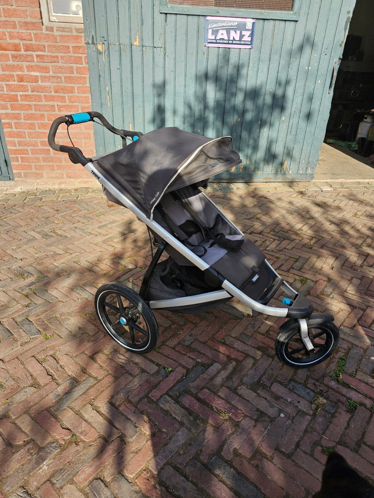 Thule Urban Glide 2 met regenhoes, Ophalen, Gebruikt, Overige merken, Regenhoes
