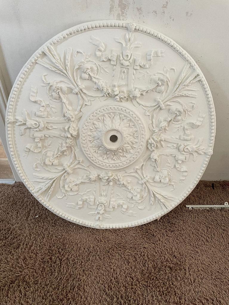 Plafond ornament, Ophalen