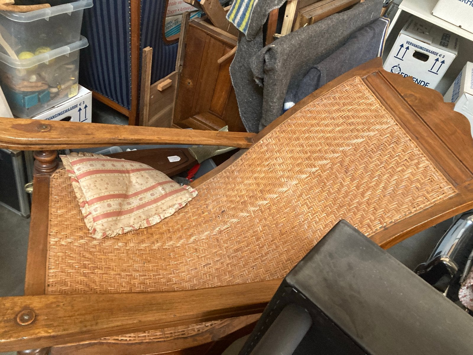Antieke rotan ligstoel, Ophalen