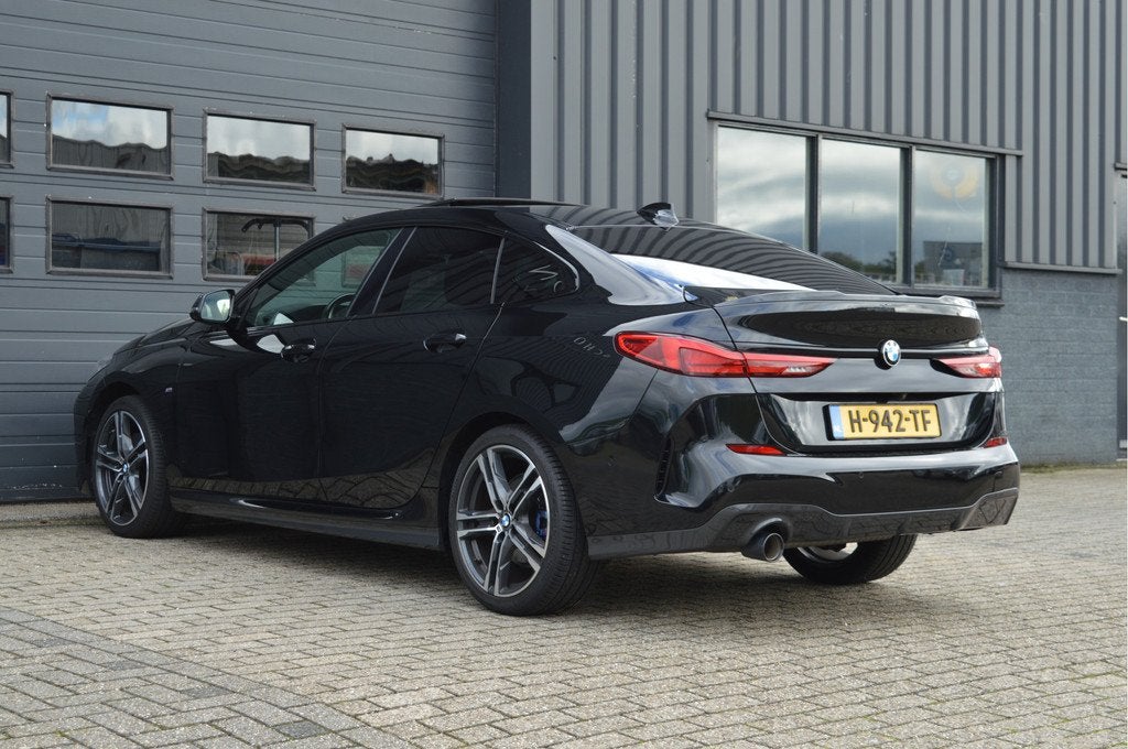 BMW 2 Serie Gran Coupé 218i High Executive Edition | M-PAKK, Auto's, Gebruikt, 1350 kg, Met garantie (alle), Zwart