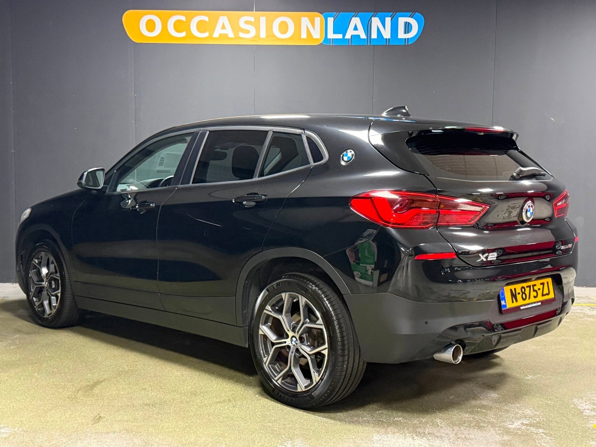 BMW X2 SDrive18i Executive|CAMERA|BLUETOOTH|STOELV|PDC|18INC, Dealer onderhouden, Gebruikt, Zwart, Parkeerassistent