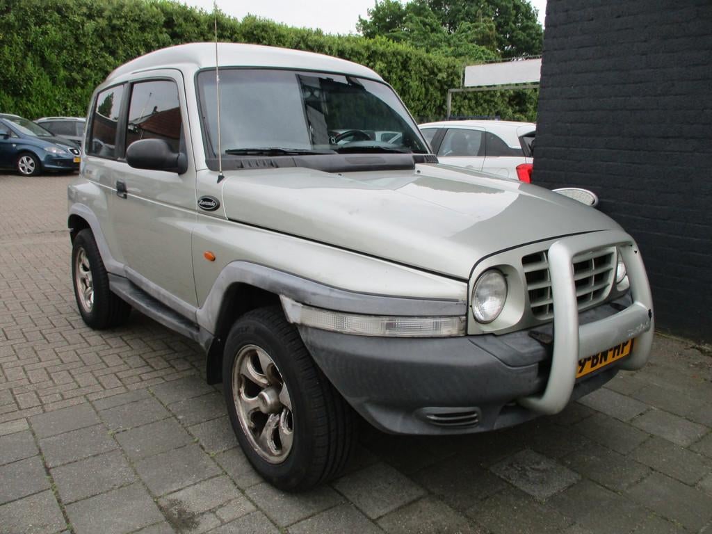 SsangYong Korando 2.9 TDL 4WD! 2800 TREKGEWICHT! GRIJS KENTE, Gebruikt, Leder en Stof, Origineel Nederlands, Bedrijf