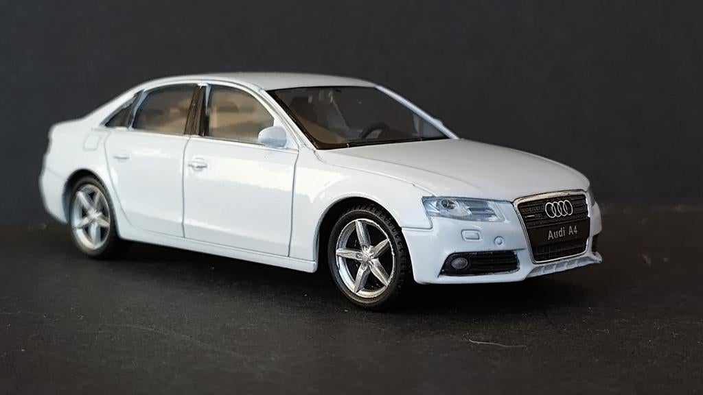 Audi A4 B8 1:43 Welly Pol, Overige merken, Auto, Verzenden, .